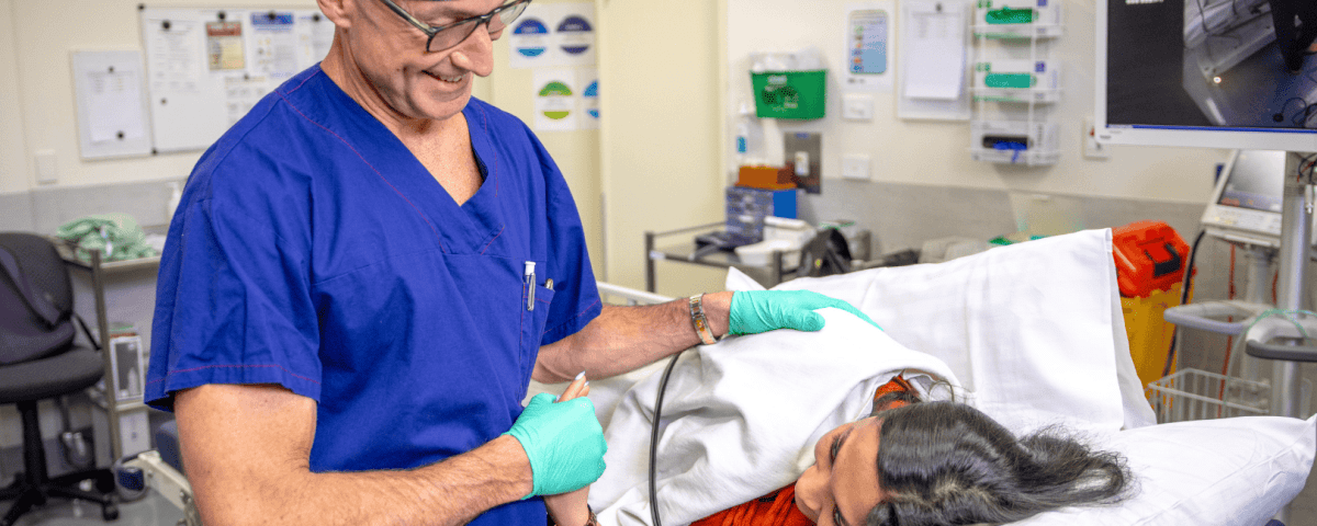 Bariatric surgeon offering support to patient on surgery day