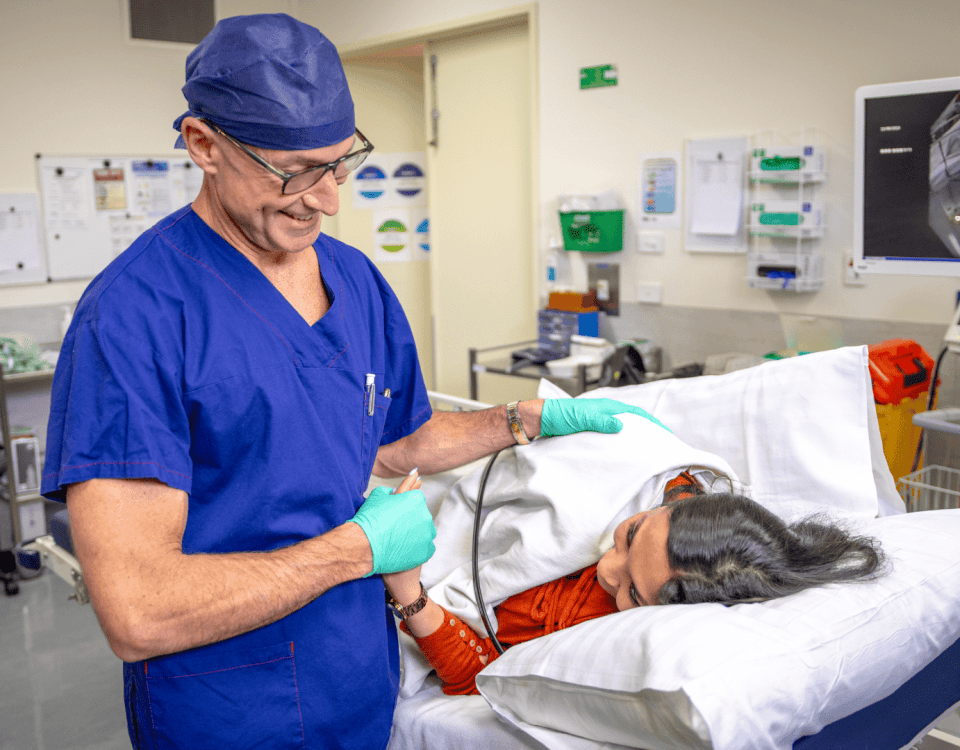 Bariatric surgeon offering support to patient on surgery day